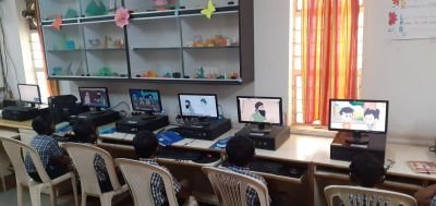 3rd std students in language Lab  to watching English stories